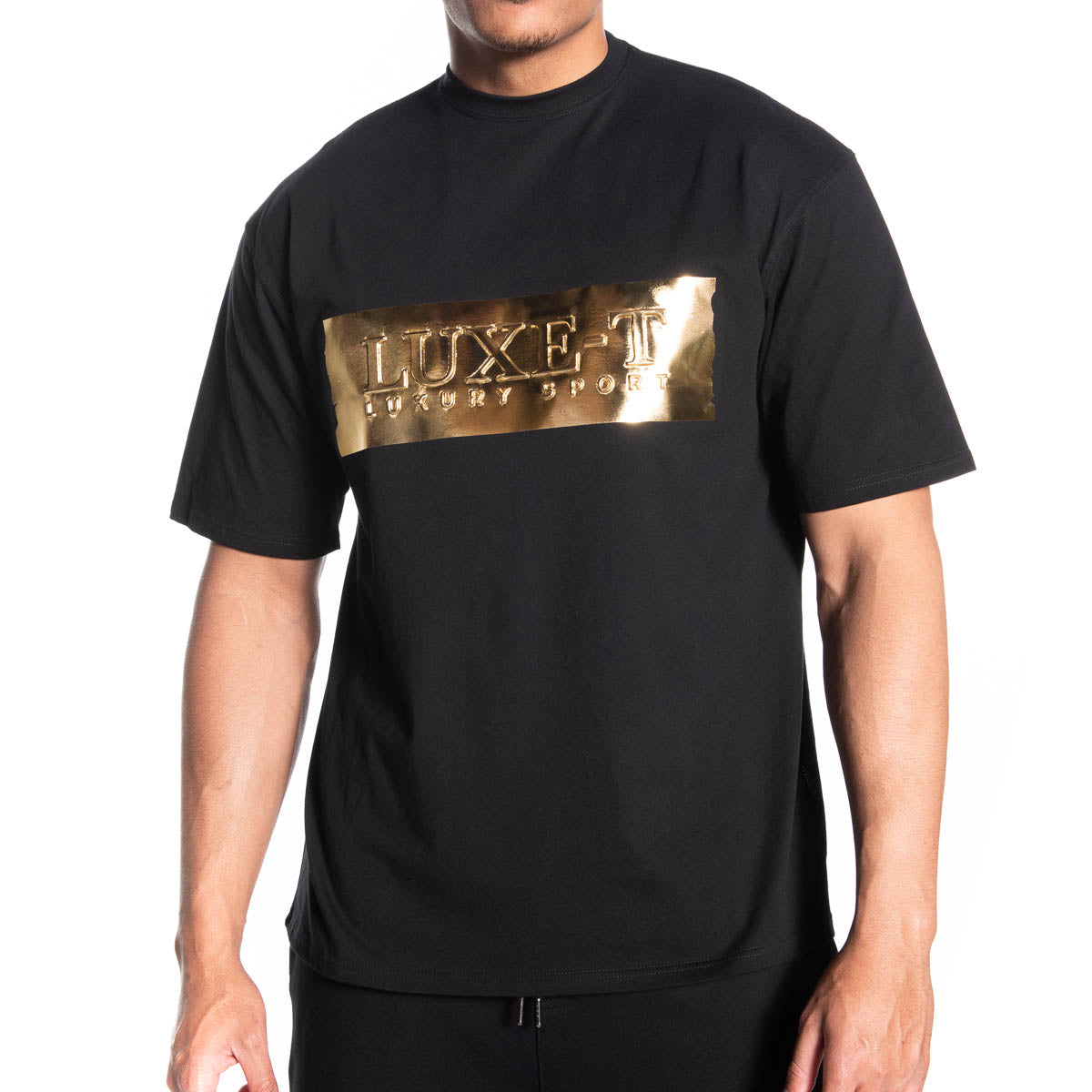 Black t shop shirt gold print